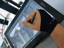 aldg studio en poste sur son ordinateur